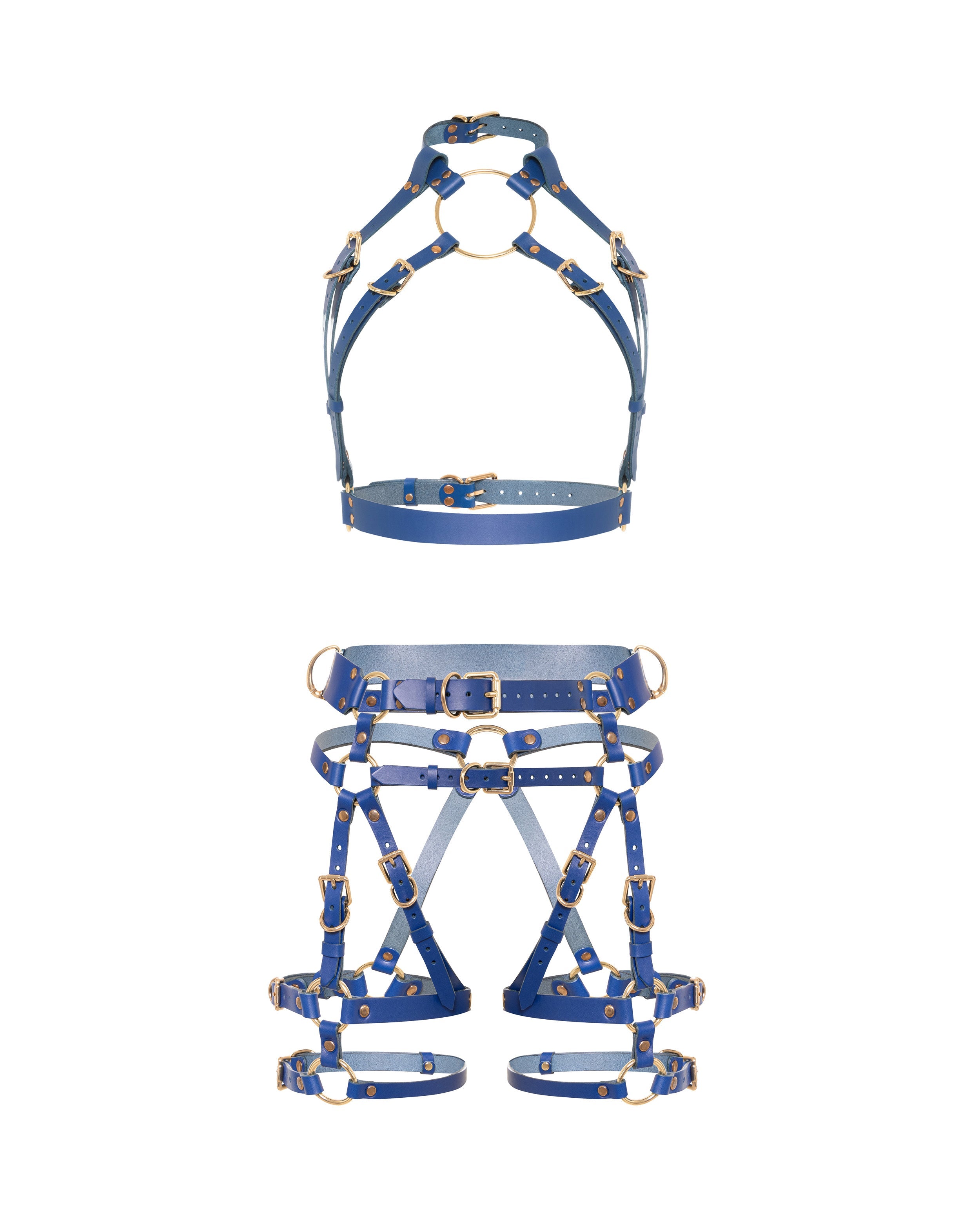 Pictured is a set of green leather full body harnesses with gold hardware.  Harness open bust and chain and open butt and crotchless garter harness.
