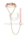 BDSM choke collar with a pink leather handle and gold hardware. Designed for control and comfort in BDSM play.