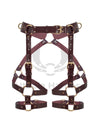 Leather garter belt is made of marsala-colored genuine leather and gold-colored metal hardware. Photo is made in 3D to show each strap from both the outside and inside. 
Front view.