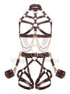 Leather harness with open bust and chains paired with leather garter belt open butt and crotchless. Photographed on an invisible mannequin, showing how each harness will sit on the figure. Marsala leather, gold hardware. Front view