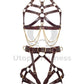 Leather harness with open bust and chains paired with leather garter belt with open butt and crotchless. Photographed on an invisible mannequin, showing how each harness will sit on the figure. Marsala leather, gold hardware. Front view.