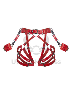 Leather garter belt with open butt and crotchless harness. With handcuffs fastened to D-rings. Front view on invisible mannequin. Demonstrates how the harness will sit on the body. Dark nickel hardware, red leather.