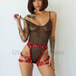 Leather garter belt. Front view of the model shows how the straps encircle the crotch leaving open access. Demonstrates how the belt will sit on the body. Dark nickel hardware, red leather.