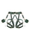 Leather garter belt with open butt and crotchless harness. With handcuffs fastened to D-rings. Front view on invisible mannequin. Demonstrates how the harness will sit on the body. Gold hardware, green leather.