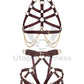 Leather harness with open bust and chains paired with leather garter belt with open butt and crotchless. Photographed on an invisible mannequin, showing how each harness will sit on the figure. Marsala leather, gold hardware. Front view.