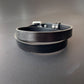 Black leather chopker on a gray background