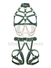 Leather harness with open bust and chains paired with leather garter belt with open butt and crotchless. Photographed on an invisible mannequin, showing how each harness will sit on the figure. Green leather, gold hardware. Front view.