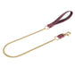 Gold chain leash with a marsala leather handle on a white background