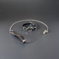 Leather collar and chain leash set on a gray background