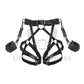 Leather garter belt with open butt and crotchless harness. With handcuffs fastened to D-rings. Front view on invisible mannequin. Demonstrates how the harness will sit on the body. Dark nickel hardware, black leather.
