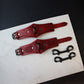 red leather handcuffs 
