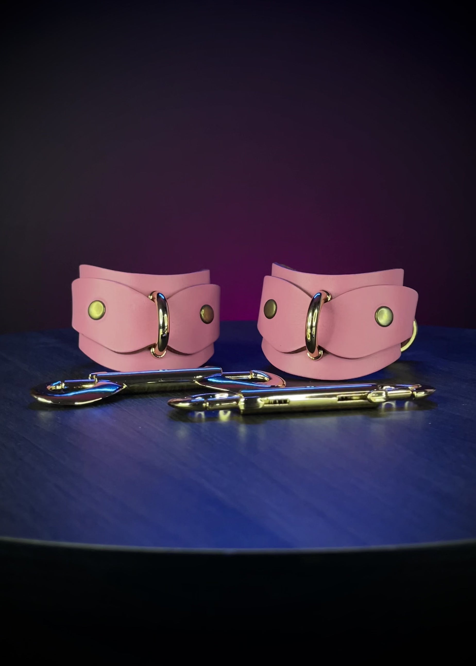 Pink leather cuffs